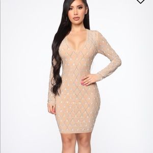 Dramatic effect rhinestone nude mini dress